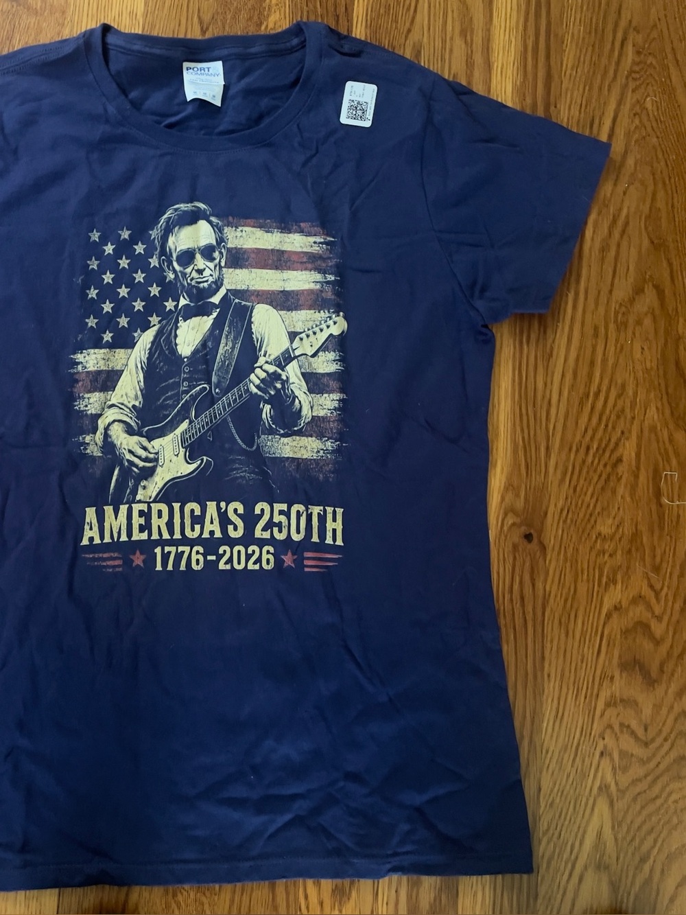 Port and Company Navy Americana Graphic Tee - Abraham Lincoln Guitar 1776-2026